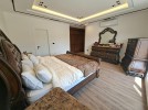 First-floor apartment for sale in Qaryet Al-Nakheel with a building area of 243m