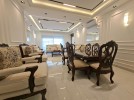 First-floor apartment for sale in Qaryet Al-Nakheel with a building area of 243m