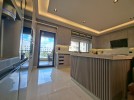 First-floor apartment for sale in Qaryet Al-Nakheel with a building area of 243m