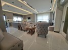 First-floor apartment for sale in Qaryet Al-Nakheel with a building area of 243m