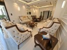 First-floor apartment for sale in Qaryet Al-Nakheel with a building area of 243m