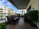 First-floor apartment for sale in Qaryet Al-Nakheel with a building area of 243m